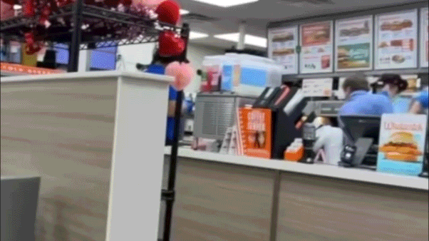 Whataburger worker fends off alleged attacker with trash can in viral brawl