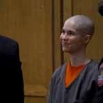 Woman who smiled in court gets 28 years for murdering her own father