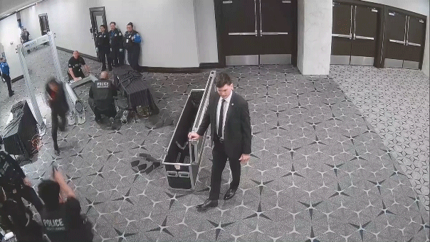 DOJ video shows suspect rushing security checkpoint before WHCD shooting