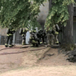 Apartment explosion caught on video as firefighters escape in Washington state
