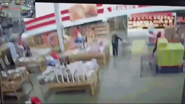 Warehouse shoppers dodge disaster when roof gives way during savage storm